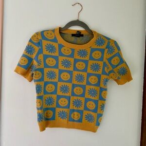 Checkered colorful smiley and floral short sleeve sweater shirt